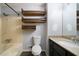 Bathroom with a bathtub, toilet, and shelving at 34 Cedar Creek Ct, Acworth, GA 30101