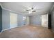 A bedroom with bare floors, awaiting flooring upgrades at 34 Cedar Creek Ct, Acworth, GA 30101