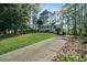 A cozy home nestled among trees, offering a sense of privacy and tranquility at 34 Cedar Creek Ct, Acworth, GA 30101