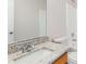 Bathroom featuring granite countertops and tile backsplash at 7806 Poppy Seed Pl, Winston, GA 30187