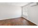Bright bedroom with hardwood floors, a window, and modern climate control at 7806 Poppy Seed Pl, Winston, GA 30187