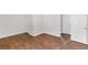 Bedroom featuring wood-look flooring and neutral paint at 7806 Poppy Seed Pl, Winston, GA 30187