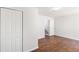 Room with stairs in the background and neutral paint at 7806 Poppy Seed Pl, Winston, GA 30187