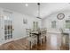 Dining area with a table set for six, located next to a walk-in pantry at 225 Valley Dr, Roswell, GA 30075