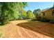 Expansive backyard showcasing the home's outdoor area and landscaping at 50 S Underwood Dr, Covington, GA 30016