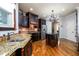 Well-appointed kitchen with granite countertops, custom cabinetry, and stainless steel appliances at 50 S Underwood Dr, Covington, GA 30016
