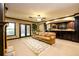 Entertainer's dream featuring a wet bar, backyard access and living room area at 50 S Underwood Dr, Covington, GA 30016