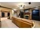Spacious living room with fireplace, TV, stairs and comfortable seating at 50 S Underwood Dr, Covington, GA 30016