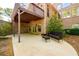 Covered patio with seating area, providing an ideal outdoor living space at 50 S Underwood Dr, Covington, GA 30016