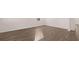A naturally lit living room showcases hardwood floors and ample space at 632 Kimberwick Dr, Locust Grove, GA 30248
