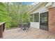 Charming back deck with outdoor seating, perfect for enjoying the surrounding natural beauty at 918 Guinevere Way, Lilburn, GA 30047