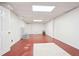 Finished basement with a large open space, neutral paint color, and ample potential at 918 Guinevere Way, Lilburn, GA 30047