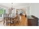Charming dining room with natural light and hardwood floors at 918 Guinevere Way, Lilburn, GA 30047