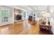 Comfortable living room features a stone fireplace and hardwood floors at 918 Guinevere Way, Lilburn, GA 30047
