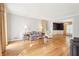 Spacious living room boasts gleaming hardwood floors and abundant natural light at 918 Guinevere Way, Lilburn, GA 30047