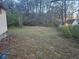 Spacious backyard with room for activities, edged by mature trees at , Stockbridge, GA 30281