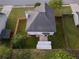 Aerial view of a backyard that features an outdoor storage shed with a surrounding fence at 1389 Shadow Creek Ave, Hampton, GA 30228