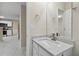 Bathroom with granite countertop and chrome fixtures at 1389 Shadow Creek Ave, Hampton, GA 30228