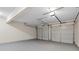 Two-car garage featuring epoxy flooring and automatic doors, offering ample parking at 1389 Shadow Creek Ave, Hampton, GA 30228