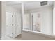 Hallway with multiple doors at 1389 Shadow Creek Ave, Hampton, GA 30228
