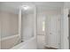 Hallway with white trim and doors at 1389 Shadow Creek Ave, Hampton, GA 30228