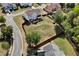 Spacious backyard with a patio, fire pit, shed, and lush lawn, perfect for outdoor entertaining at 209 Crestmont Way, Canton, GA 30114