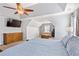 Bedroom with an oversized ceiling fan and a seating area near the window at 209 Crestmont Way, Canton, GA 30114
