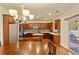 Well lit kitchen featuring wood cabinets and stainless steel appliances at 209 Crestmont Way, Canton, GA 30114