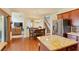Open kitchen floor plan concept with wooden cabinets and granite countertops at 209 Crestmont Way, Canton, GA 30114