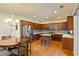 Spacious kitchen with stainless steel appliances and central island at 209 Crestmont Way, Canton, GA 30114