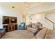 Spacious living room featuring high ceilings, cozy furniture, and plenty of natural light at 209 Crestmont Way, Canton, GA 30114