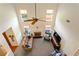 Aerial view of a living room with a fireplace, a ceiling fan, and a leather sofa at 209 Crestmont Way, Canton, GA 30114