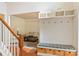 Entryway featuring custom storage solutions, including built-in bench seating and shelving at 209 Crestmont Way, Canton, GA 30114