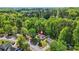 Idyllic aerial view of home surrounded by lush greenery and mature trees at 2139 Briar Glen Sw Ln, Atlanta, GA 30331