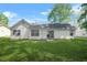 Spacious backyard with a patio and well-maintained lawn at 2139 Briar Glen Sw Ln, Atlanta, GA 30331