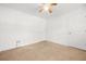 Neutral bedroom with ceiling fan, carpet, and closet at 2139 Briar Glen Sw Ln, Atlanta, GA 30331
