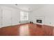 Inviting living room showcasing hardwood floors and a charming fireplace at 2139 Briar Glen Sw Ln, Atlanta, GA 30331