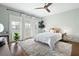 Bright bedroom with neutral decor, large windows, and walk-out access to the yard at 2155 Old Dallas Rd, Marietta, GA 30064