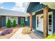Charming home exterior featuring brick facade, lush landscaping, and a welcoming entrance at 2155 Old Dallas Rd, Marietta, GA 30064