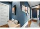 Hallway featuring elegant decor and hardwood floors, connecting various rooms within the house at 2155 Old Dallas Rd, Marietta, GA 30064