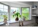 Kitchen with a farmhouse sink and bay window overlooking the outdoors at 2155 Old Dallas Rd, Marietta, GA 30064