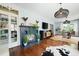 Spacious living room with hardwood floors, a fireplace, and a view of the dining area at 2155 Old Dallas Rd, Marietta, GA 30064