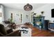Spacious living room with hardwood floors, fireplace, and access to the front entrance at 2155 Old Dallas Rd, Marietta, GA 30064