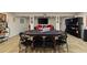 Finished basement area featuring a poker table and large screen television for entertainment at 335 Birkdale Dr, Fayetteville, GA 30215