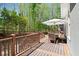 Inviting outdoor deck perfect for entertaining with ample seating and wooded views at 335 Birkdale Dr, Fayetteville, GA 30215