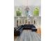 Bright and airy living room featuring high ceilings, tall windows, and a comfortable sectional sofa at 335 Birkdale Dr, Fayetteville, GA 30215