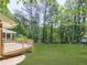 Exterior view of the back of the house and backyard at 4307 Smithsonia Ct, Tucker, GA 30084