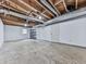 Unfinished basement with wood ceiling and concrete floors at 4307 Smithsonia Ct, Tucker, GA 30084