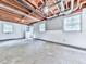 Unfinished basement with wood ceiling and concrete floors at 4307 Smithsonia Ct, Tucker, GA 30084