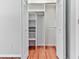 Walk-in closet with shelves and hanging racks for optimal storage at 4307 Smithsonia Ct, Tucker, GA 30084
